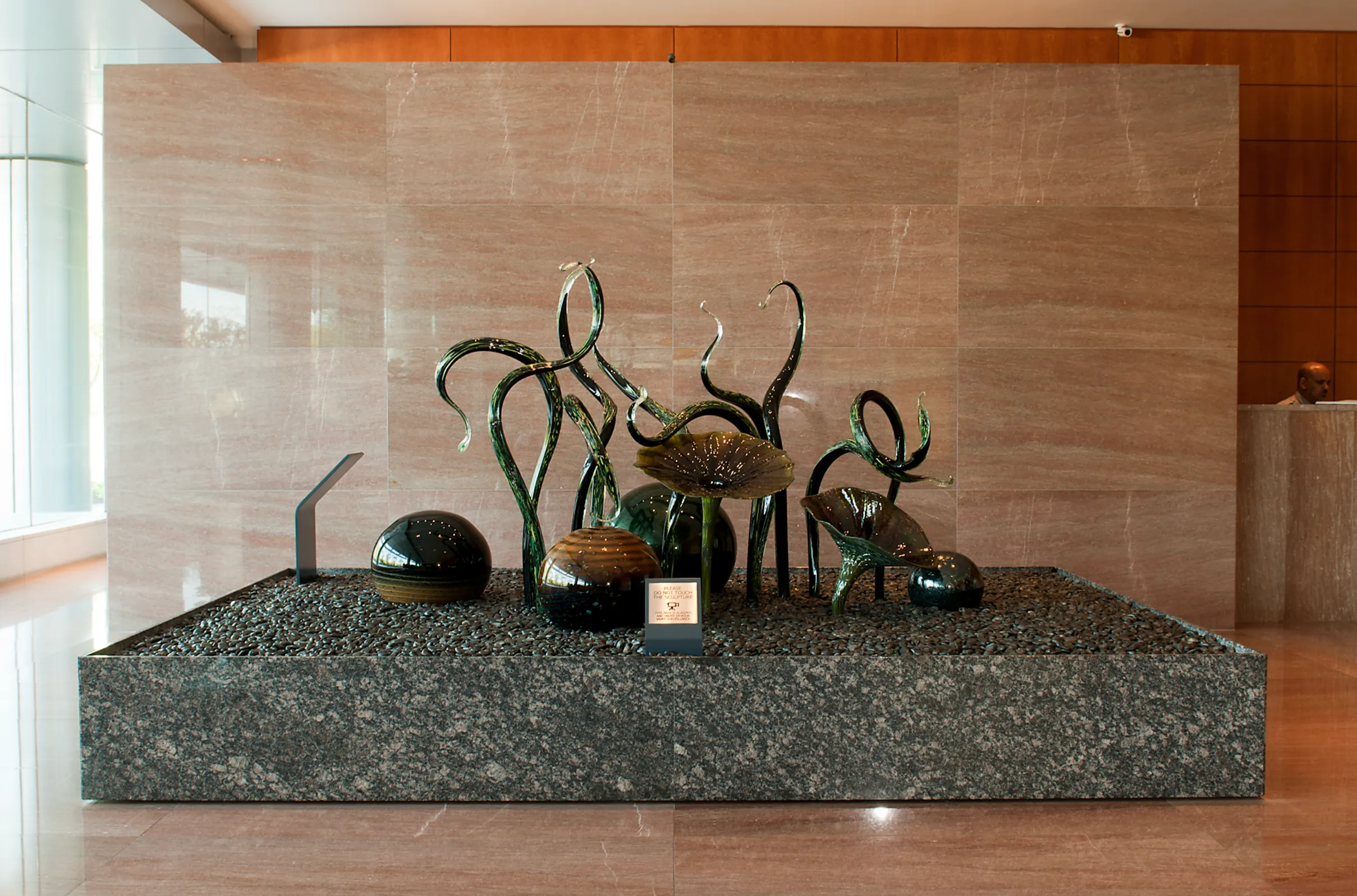 glass sculpture in a building lobby