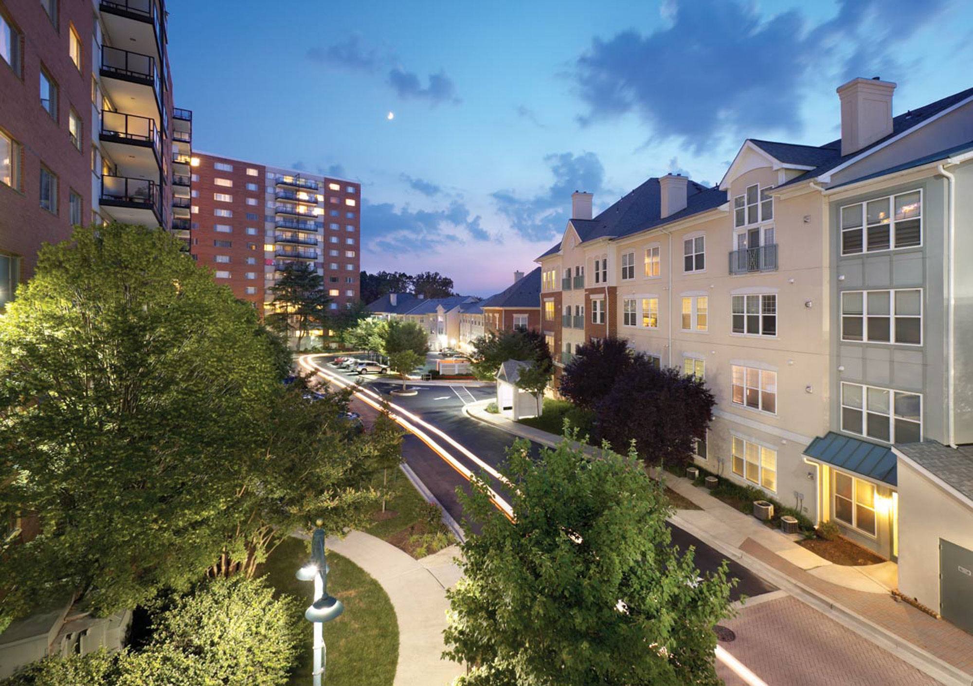 a street between residential buildings in Blair Towns at The Blairs District