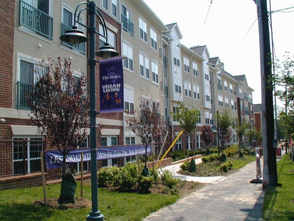 tree-lined sidewalk in Blair Towns at The Blairs District