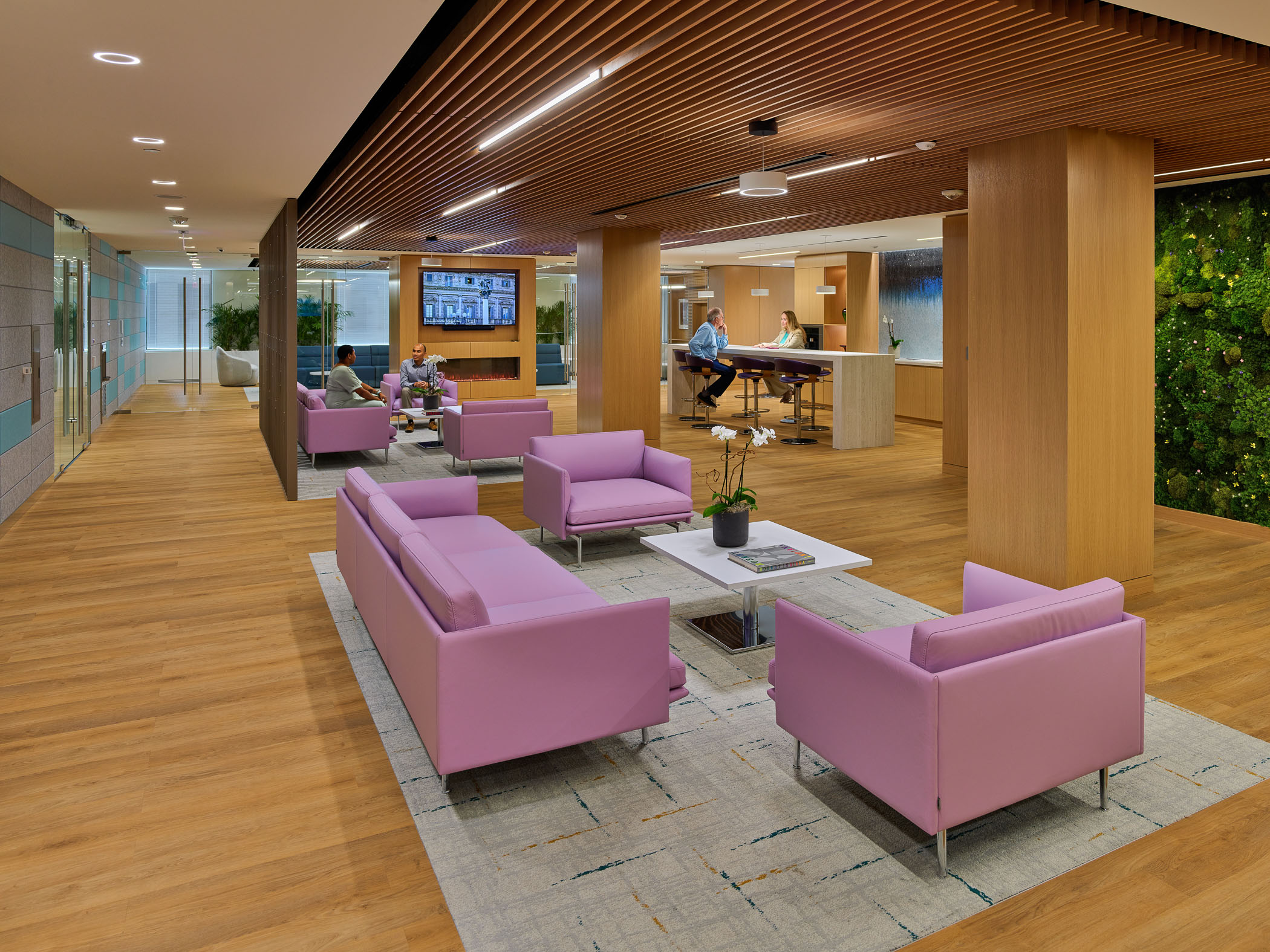 lobby area with pink sofas and armchairs
