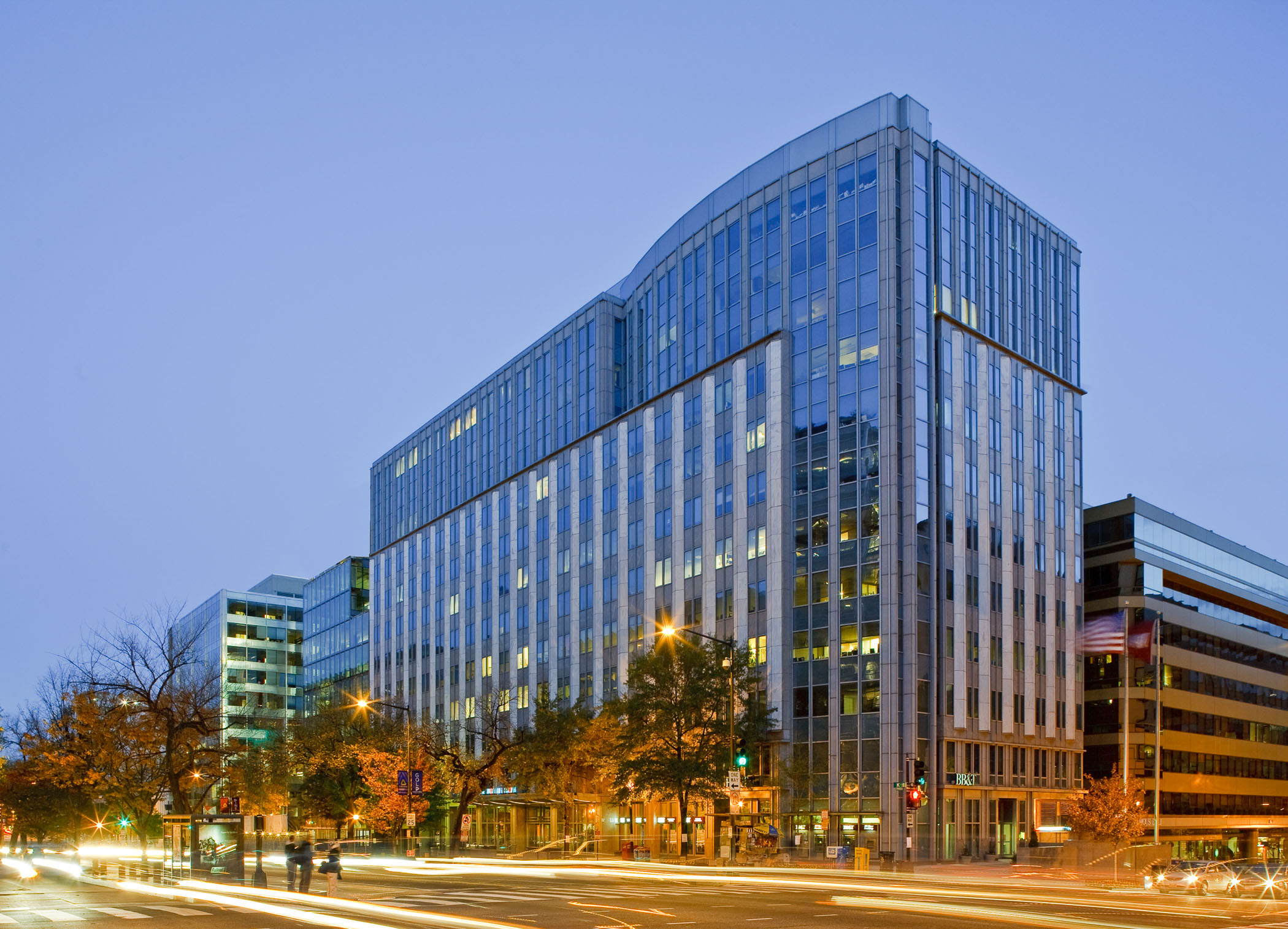 street level exterior of 1909 K Street NW at dusk