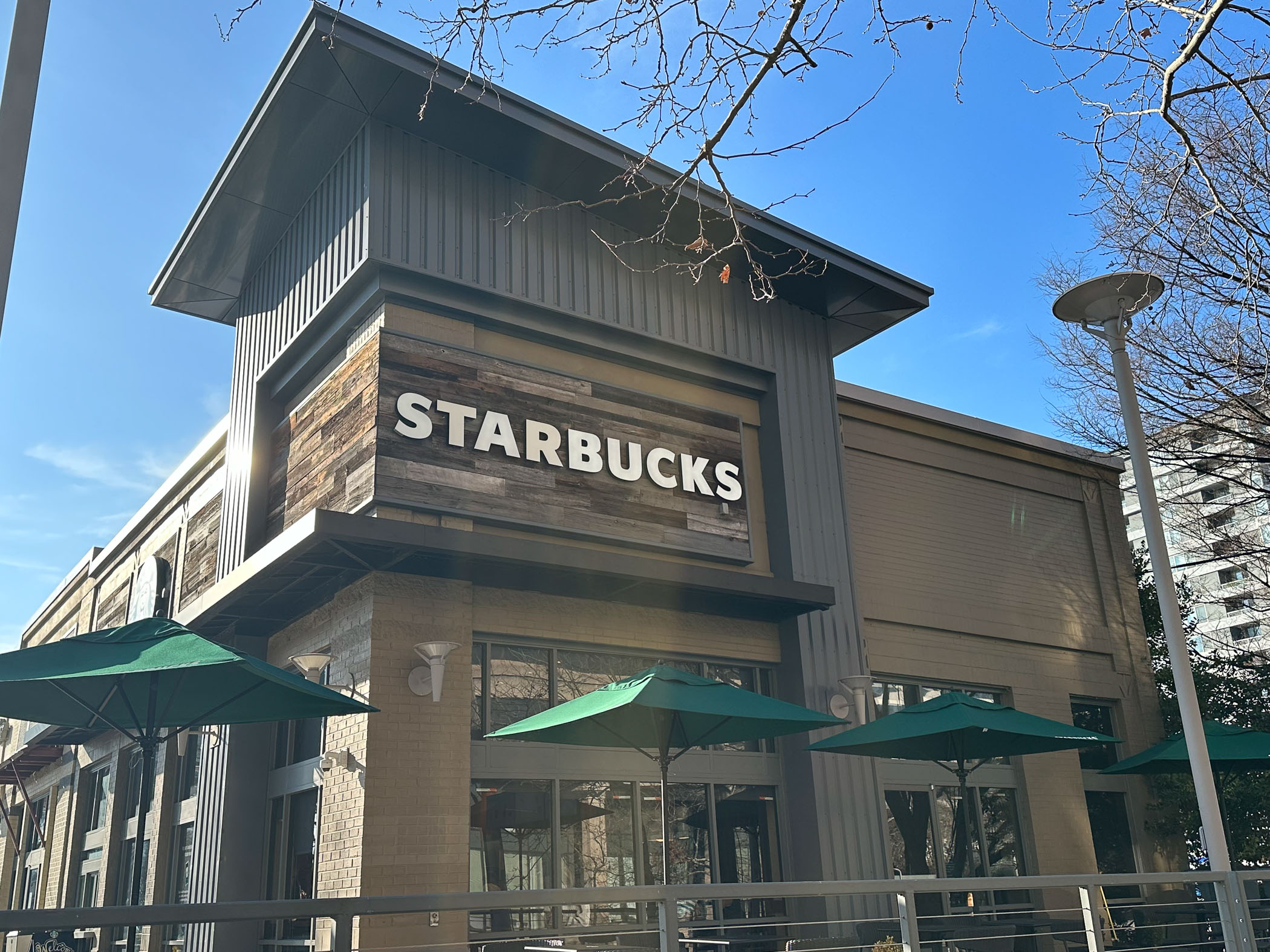 Starbucks with tables outside at The Blair District