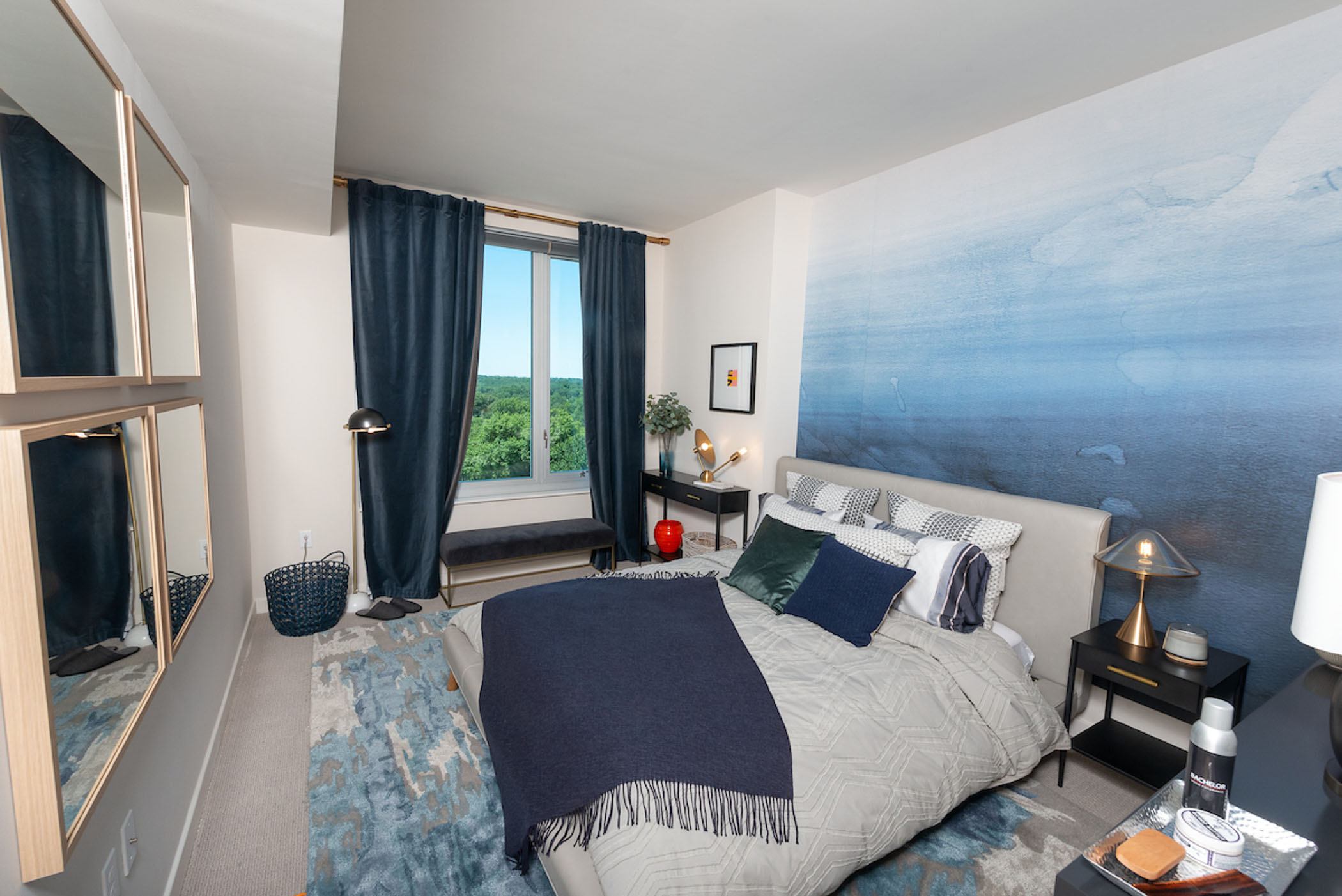 modern apartment bedroom with a large window