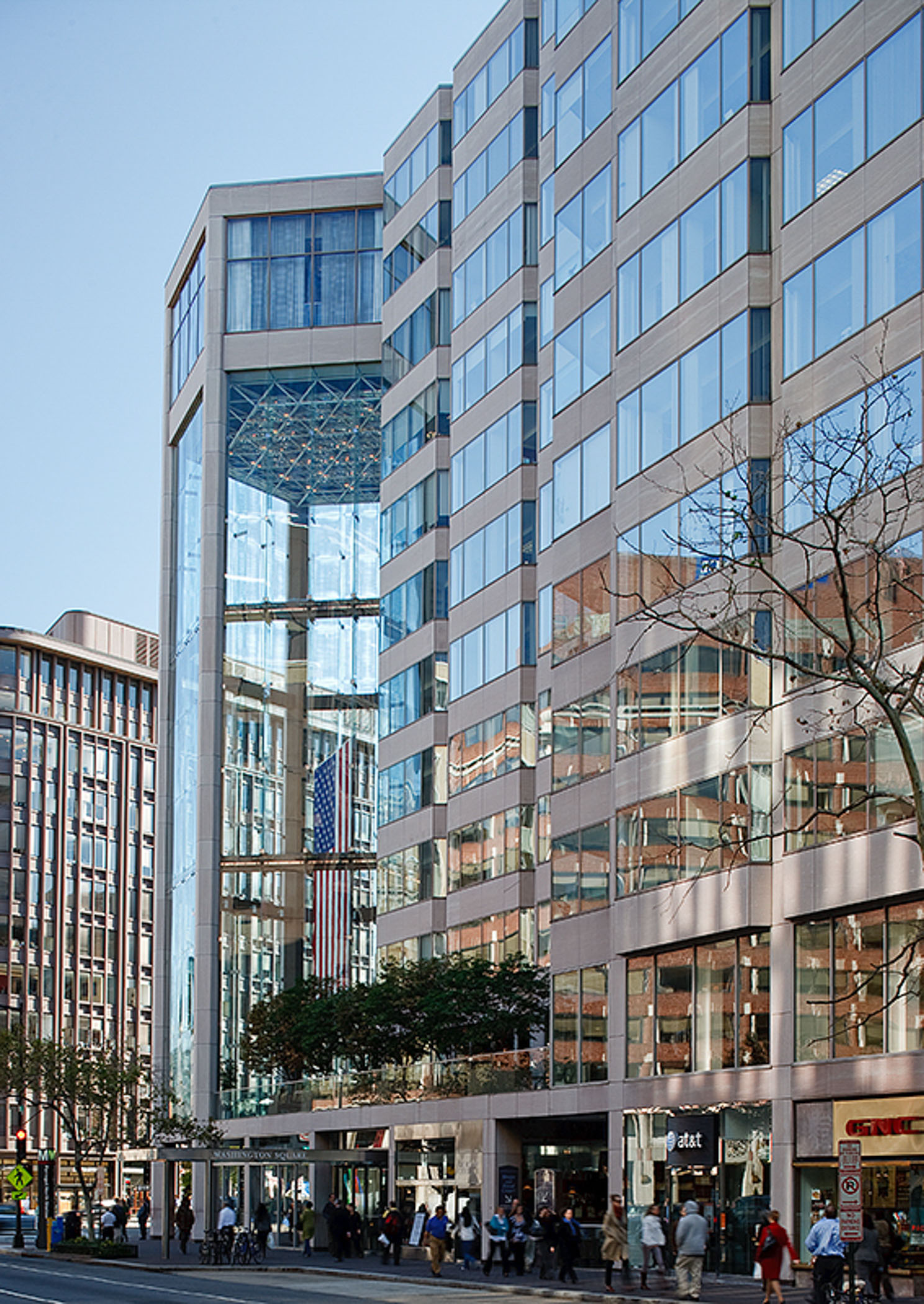 people on the sidewalk outside Washington Square